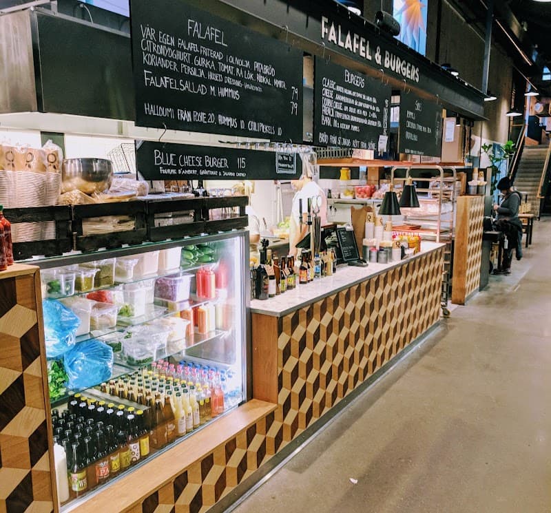 Malmö Saluhall – Halal-friendly stalls (e.g., Falafel & Burgers kiosk)